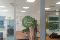 view of the entrance door of the sustainability office in the building