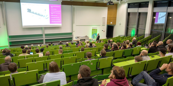 A lecture hall in which a presentation is given.