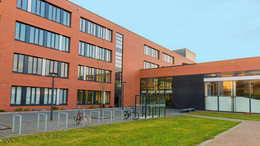 11: Business and Economics University building with class rooms inside.